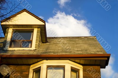 Roofs and clouds on sunset 2