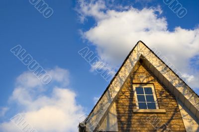 Roofs and clouds on sunset 1