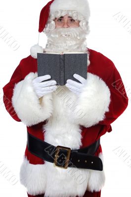 Santa Claus reading a book