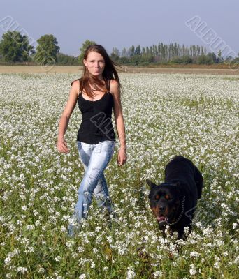 girl and rottweiler