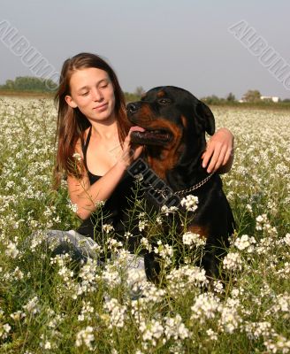 girl and rottweiler