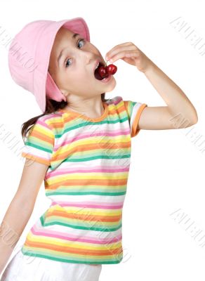 Girl eating cherries