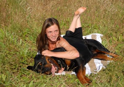 girl and rottweiler