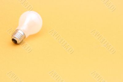 Background with lit lightbulb