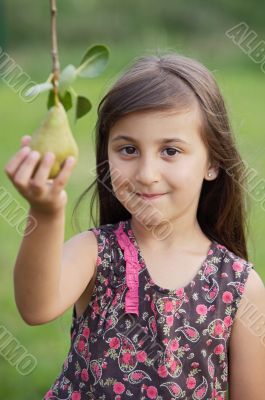 Girl taking a pear
