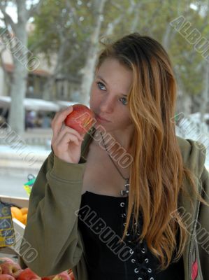teenager and red apple