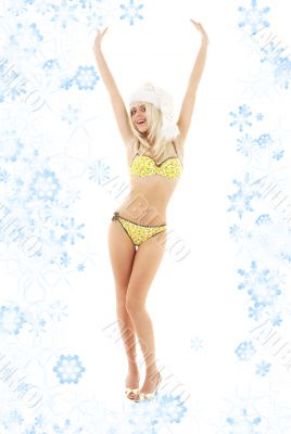 santa helper blond on high heels with snowflakes