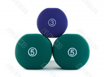 Side view of thee dumbbells