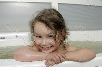 The Small girl in bath.