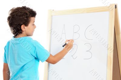 Adorable child studying