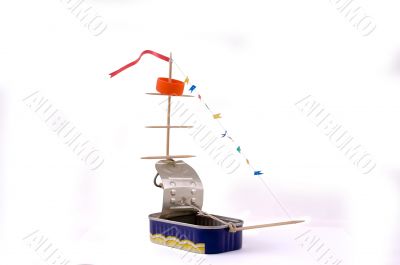Self-made toy ship from a can.