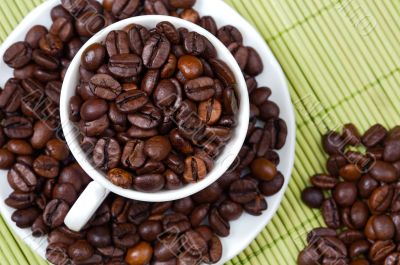 Coffee beans in a cup