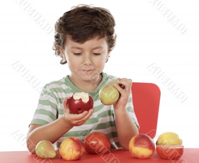 child playing with fruits