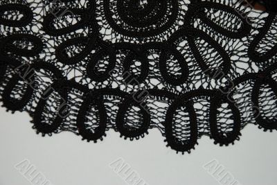 Black lace on a white background