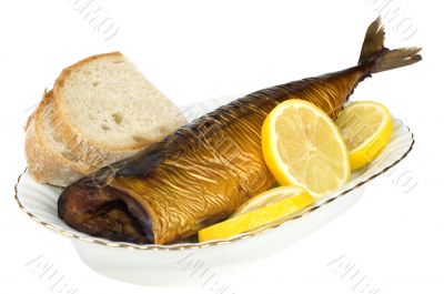 Smoked mackerel with lemon slice isolated