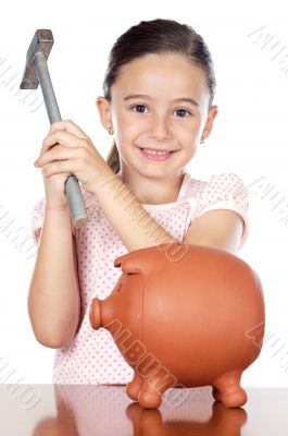 adorable boy breaking the money box