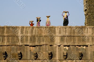 Women on a temple roof