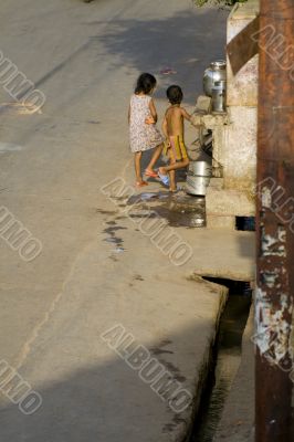 Children taking water