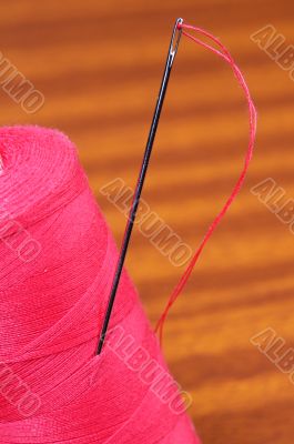 Needle with thread