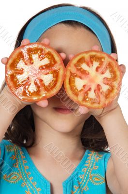 Girl with tomatoes in her eyes