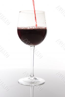 Red wine pouring down