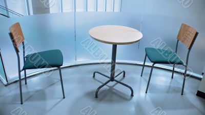 two chairs and round table