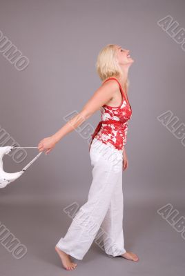 Swinging her bag