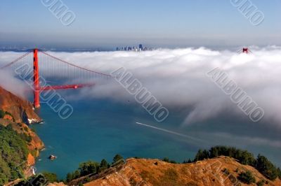 Golden gate in the clouds