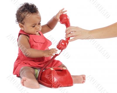 Baby girl with phone
