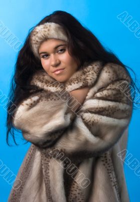 young woman in fur coat
