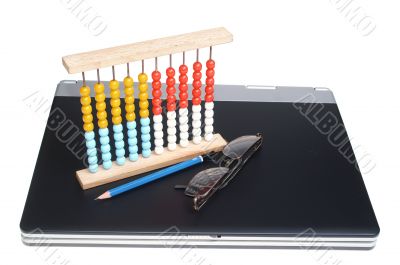 Laptop and abacus