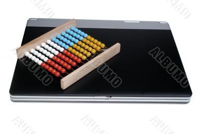 Laptop and abacus