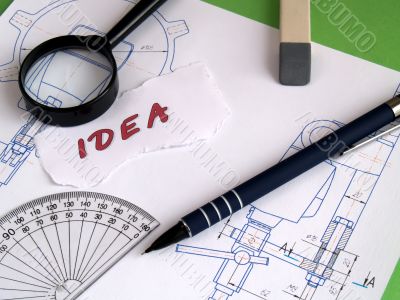 Idea, magnifier, pencil on draught