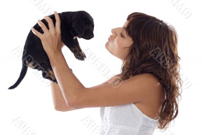 Girl holding dog