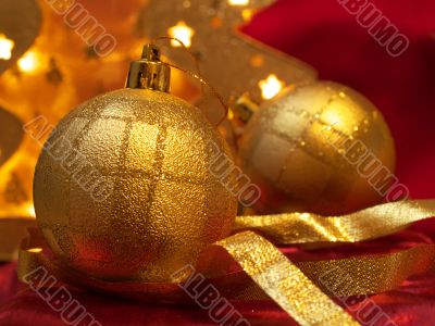 Christmas ornaments on red