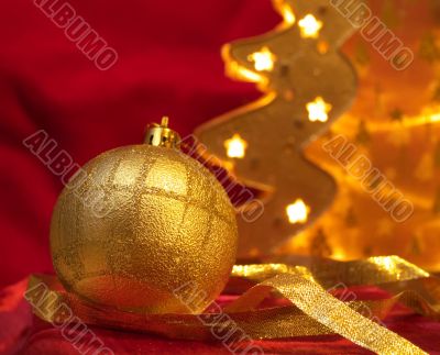 Christmas ornaments on red