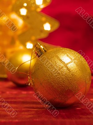 Christmas ornaments on red