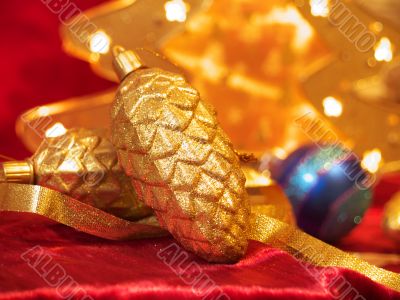 Christmas ornaments on red