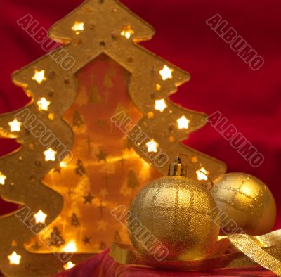 Christmas ornaments on red