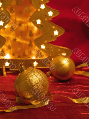 Christmas ornaments on red
