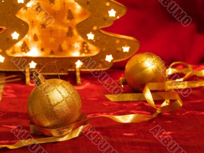 Christmas ornaments on red