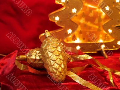 Christmas ornaments on red