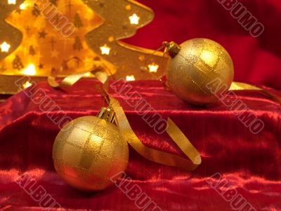 Christmas ornaments on red
