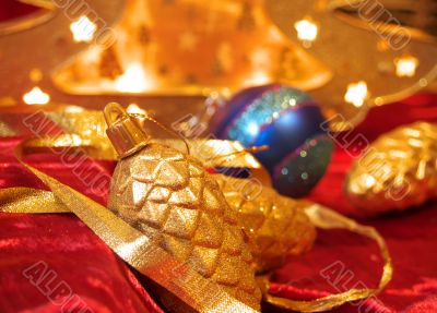 Christmas ornaments on red