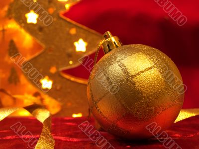 Christmas ornaments on red