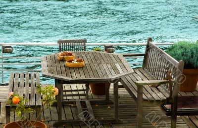 Table and benches near the riverside