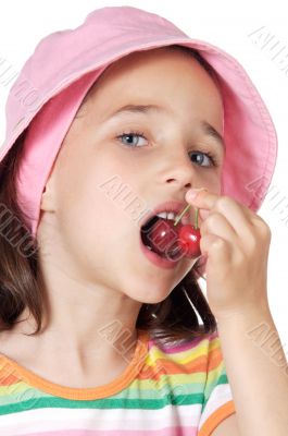 Girl eating cherries