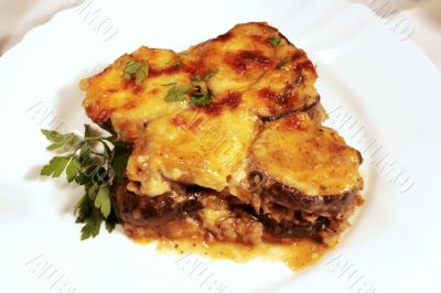 Lamb moussaka with egg plant; cheese and herbs