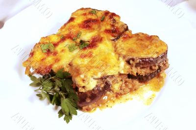 Lamb moussaka with egg plant; cheese and herbs