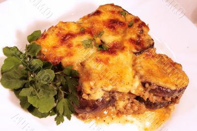 Lamb moussaka with egg plant; cheese and herbs